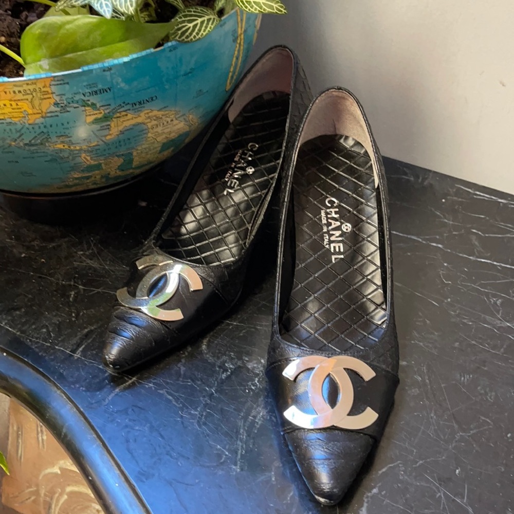 Black python Chanel pumps